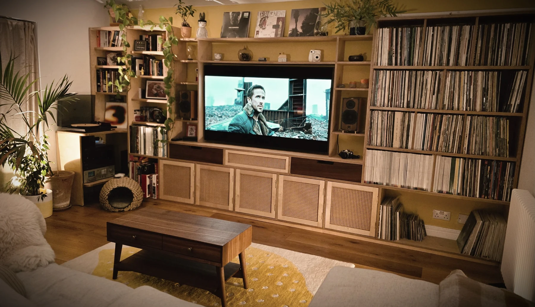 Media room installation with bespoke timber furniture and shelving